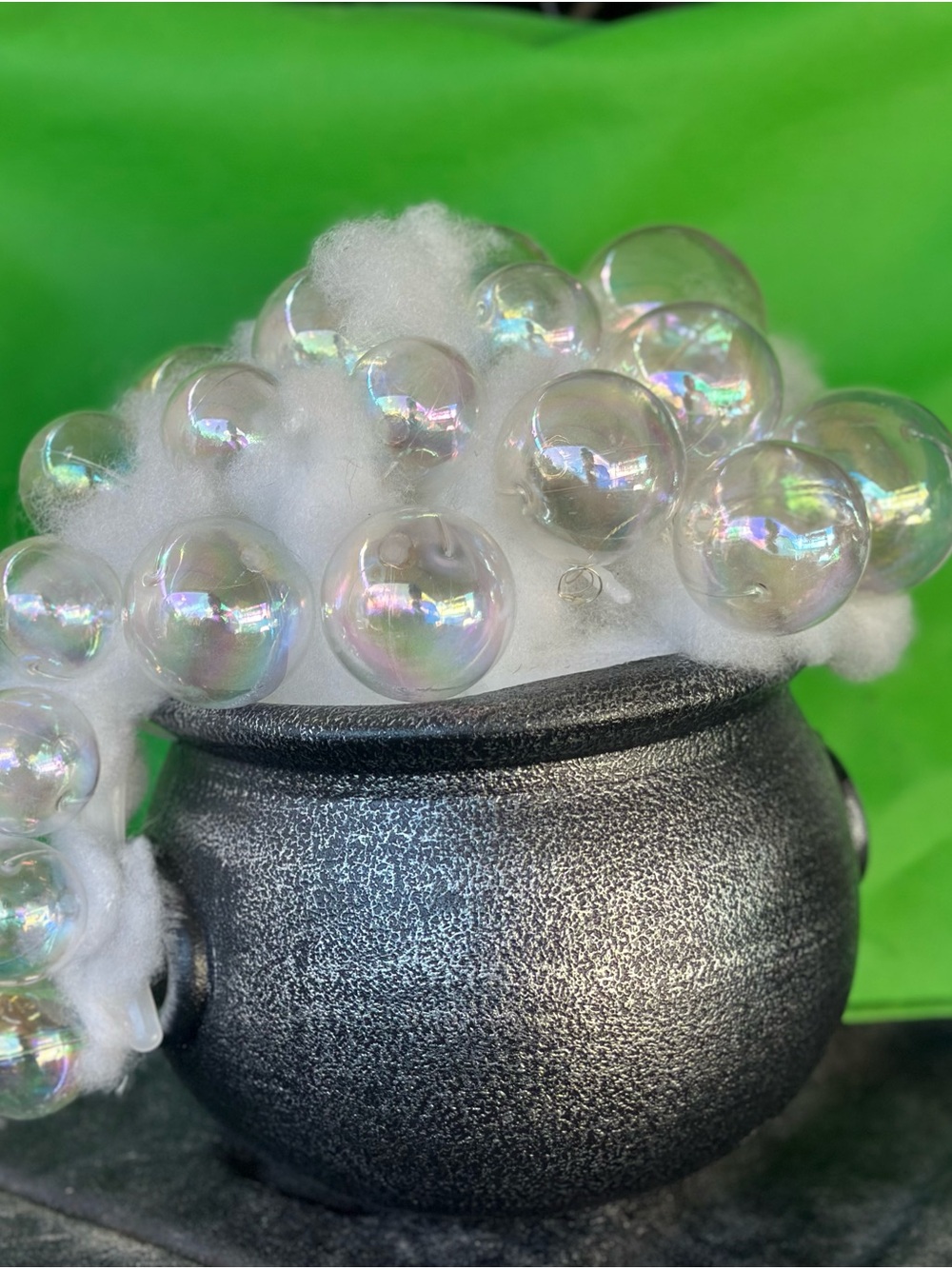 Party Cauldron Centerpiece with White Foam and Iridescent Bubbles